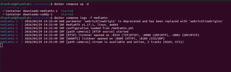 Terminal showing docker compose up -d and the MediaMTX log. The log lines confirm MediaMTX booted, the WebRTC listener opened on :8889 (HTTP) and :8189 (ICE/UDP), and the camera1 stream is available and online with H264 and G711 tracks.