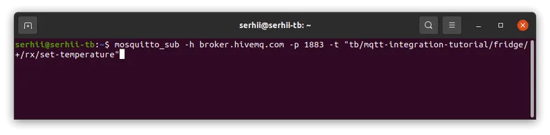 Terminal window with mosquitto_sub subscribed and waiting for downlink messages