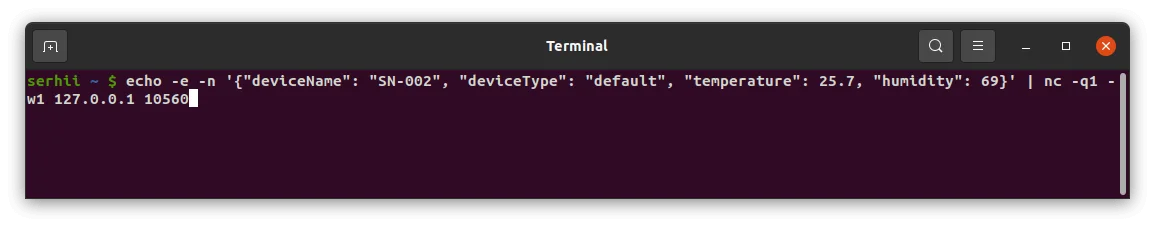 Terminal — JSON message sent to the TCP integration; no output indicates successful delivery