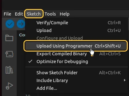 Go to "**Sketch**" > "**Upload Using Programmer**".